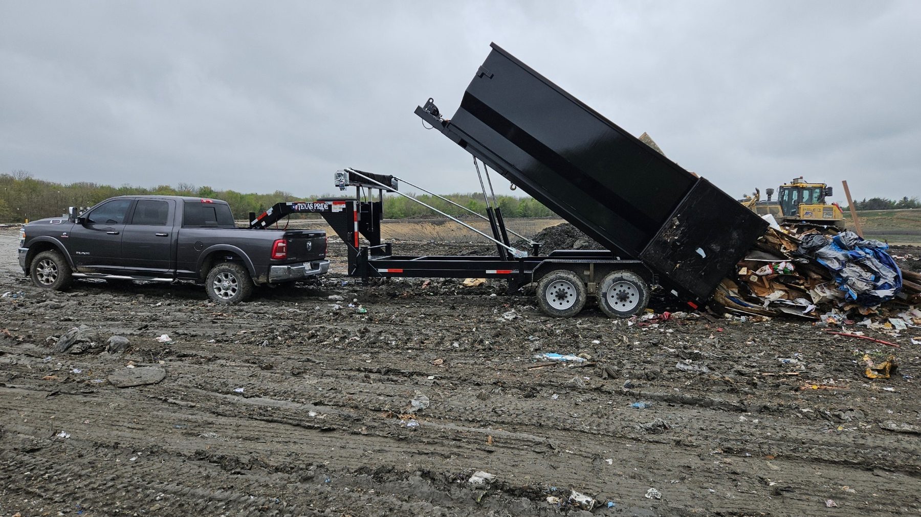 RSS truck dumping a load at the landfill